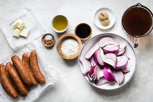 Quartered red onions, pork sausage links , beef stock, sausage, butter, flour & mustard