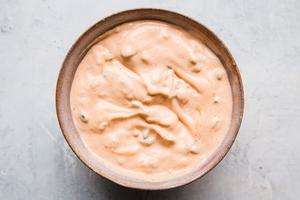 a bowl of sauce for banh mi burgers