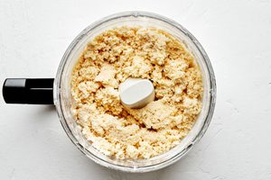 flour, salt, butter, eggs and ice water in a food processor to make homemade flaky empanada dough