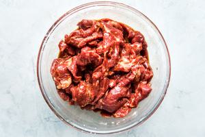 marinated beef in a glass bowl