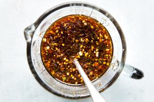 stir fry sauce in a bowl with a spoon