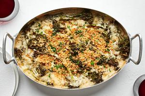 broccolini au gratin in a baking dish topped with toasted panko and parsley