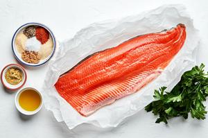 1 pound salmon, olive oil, brown sugar, salt, paprika, garlic powder, onion powder, pepper, mustard & parsley in prep bowls