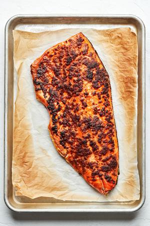 broiled salmon seasoned with olive oil, brown sugar, salt, paprika, garlic powder, onion powder, pepper, and mustard