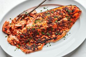 broiled salmon seasoned with olive oil, brown sugar, salt, paprika, garlic powder, onion powder, pepper, and mustard