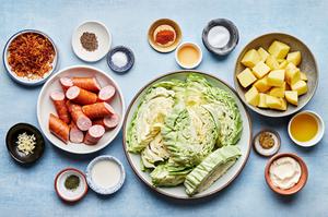 cabbage, sausage, potatoes, spices, mayonnaise, olive oil, stone ground mustard and apple cider vinegar in prep bowls