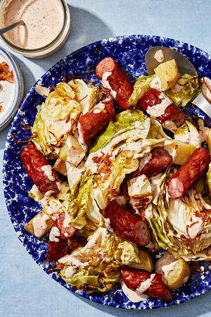 roasted cabbage, sausage and potatoes drizzled with homemade sauce