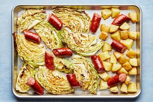 cabbage, sausage and potatoes roasted on a sheet pan