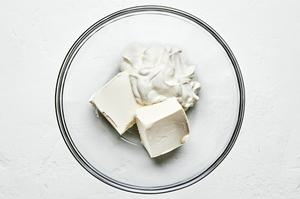 cream cheese and sour cream in a bowl