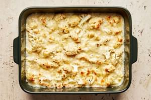 cauliflower au gratin made with milk, Parmesan, Gruyère, butter, spices, shallot, fresh garlic and