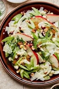 celery pear and hazelnut salad topped with blue cheese and pear vinaigrette