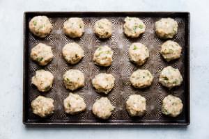 chicken meatballs on a sheet pan made with ground chicken, eggs, onions and parsley