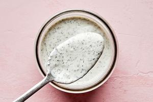 chèvre ranch dressing in a jar made with buttermilk, mayonnaise, yogurt, chèvre, parsley, onion & garlic powder, dill & salt