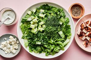 lettuce, chicken, chèvre, Chèvre Ranch and fresh herbs in bowl to make a chicken chop salad