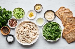 shredded chicken, mayo, dijon, spices, celery, pecans, parsley, lemon zest & lemon juice in prep bowls to make chicken salad