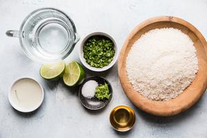 cilantro, rice, oil, salt, lime zest and juice in prep bowls to make cilantro lime rice