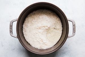 rice, water and oil in a pot