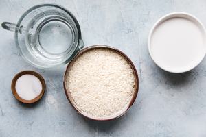 jasmine rice, sugar, salt, water and coconut milk in separate prep bowls to make coconut rice