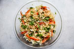 Asian inspired cold ramen noodle salad in a glass bowl