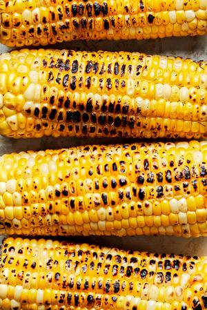 4 ears of grilled corn on the cob