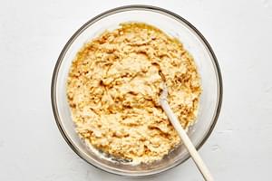 Cornbread muffin mixture, whisked together in a bowl