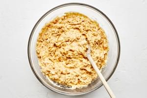Cornbread muffin mixture, whisked together in a bowl
