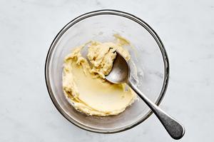 a bowl of mashed potatoes for serving with Creamy Chicken Skillet with Asparagus and Peas