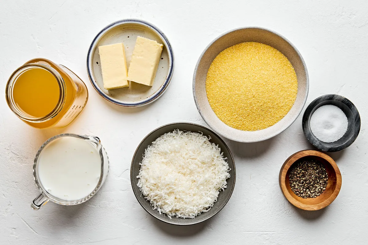 chicken stock, milk, ground polenta, butter, Parmesan, salt and pepper in prep bowls