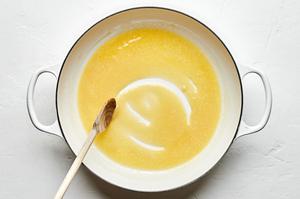 melted butter and flour being stirred in a skillet