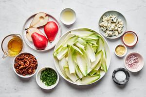 pears, endives, Roquefort, chives, candied walnuts, olive oil, dijon, lemon juice, honey and salt in prep bowls
