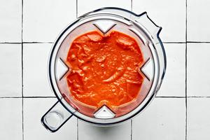 spicy tomato sauce in a blender made with san marzano tomatoes, basil, onion, spices, butter & red pepper flakes