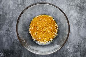 honey mustard dressing made with olive oil, vinegar, shallot, Dijon, honey, lemon zest, salt, and pepper in a mixing bowl