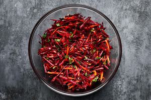 grated beet, grated carrot, parsley, mint and homemade honey mustard dressing tossed together in a large glass bowl