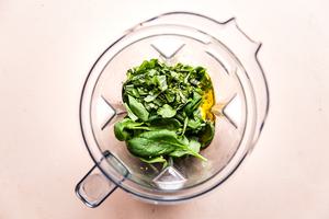 Mayonnaise, Olive oil, Lemons, Salt and pepper, garlic, Dijon, basil and spinach in the container of a blender
