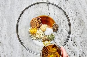 olive oil, garlic, thyme, basil, salt, pepper, lemon zest, Dijon, Worcestershire & brown sugar in a bowl to make marinade