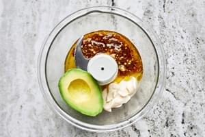 avocado, mayonnaise, lemon juice and reserved chicken marinade in a food processor