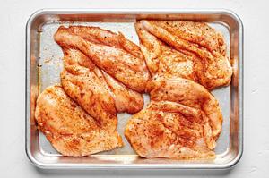 boneless, skinless, raw, chicken breast seasoned with taco seasoning