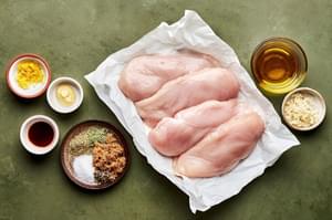 Chicken, olive oil, garlic, thyme, basil, salt, pepper, lemon zest, mustard, Worcestershire & brown sugar in prep bowls