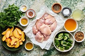 chicken, peaches, cucumbers, mint, cilantro, lemon juice, spices, honey & whole grain mustard in prep bowls