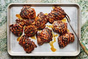 grilled honey mustard chicken resting on a baking sheet