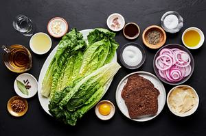 Romaine, 2 slices rye bread, red onion, spices, vinegar, Worcestershire and egg yolks in prep bowls