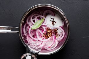 onion, vinegar, sugar, red pepper flakes, allspice, bay leaf, and cloves in a small saucepan