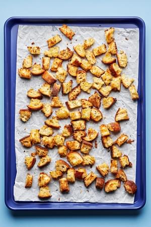 homemade croutons made with rustic bread tossed in olive oil, Italian seasoning, garlic powder & salt then baked in the oven