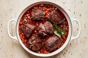 roast pieces in a pot with pancetta, onion, carrots, celery, red wine, garlic, spices red wine
