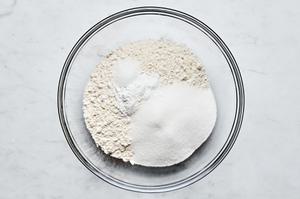 flour, baking soda, baking powder, salt and sugar in a glass bowl