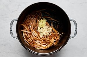 onions, garlic and ginger being cooked in a pot