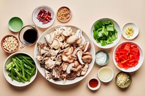mushrooms, bell peppers, green onion, peanuts, brown sugar, soy sauce, rice vinegar and spices in prep bowls