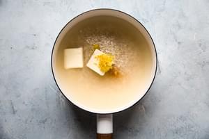 unsalted butter, lemon juice, lemon zest, chicken stock and white rice in a small sauce pan