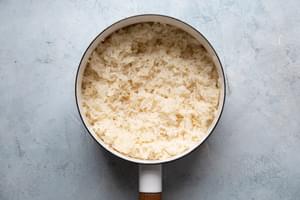 homemade lemon rice in a small sauce pan