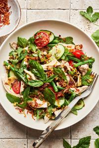 lemongrass chicken herb salad made with basil, mint, green beans, tomatoes, cucumbers and fried shallots